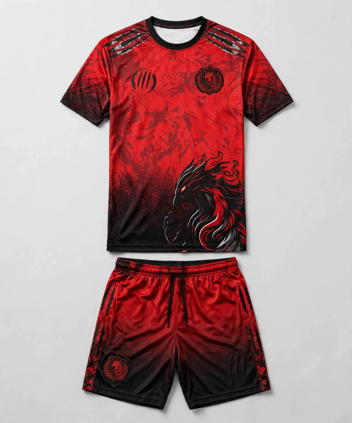 Red-black dragon jersey with claw shoulder marks and matching shorts flatlay