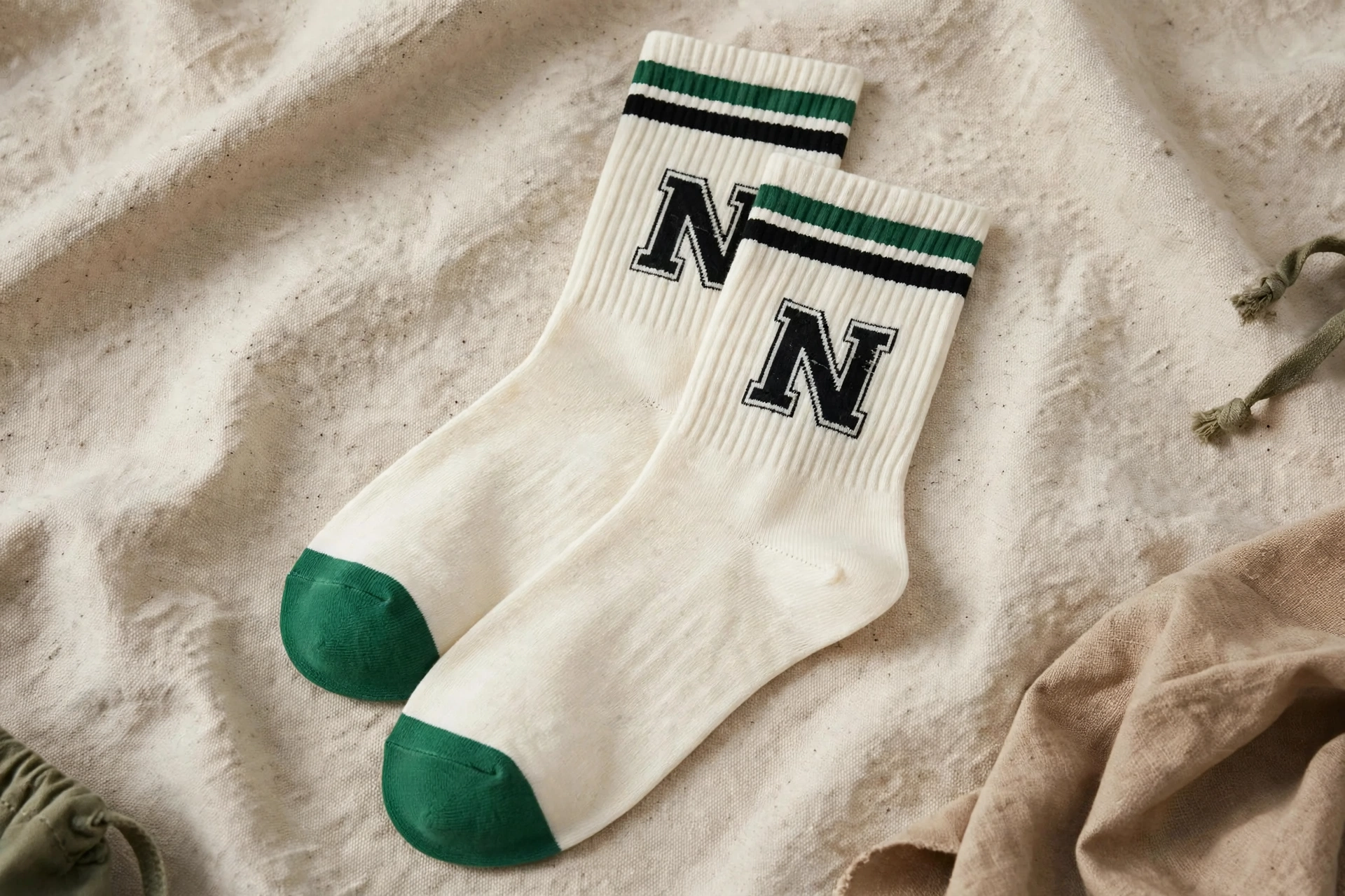 Off-white N letter crew socks with green toe and green black stripes - streetwear ribbed mid-calf socks classic heavyweight ribbed textures clean jacquard branding everyday styling 1536x1024