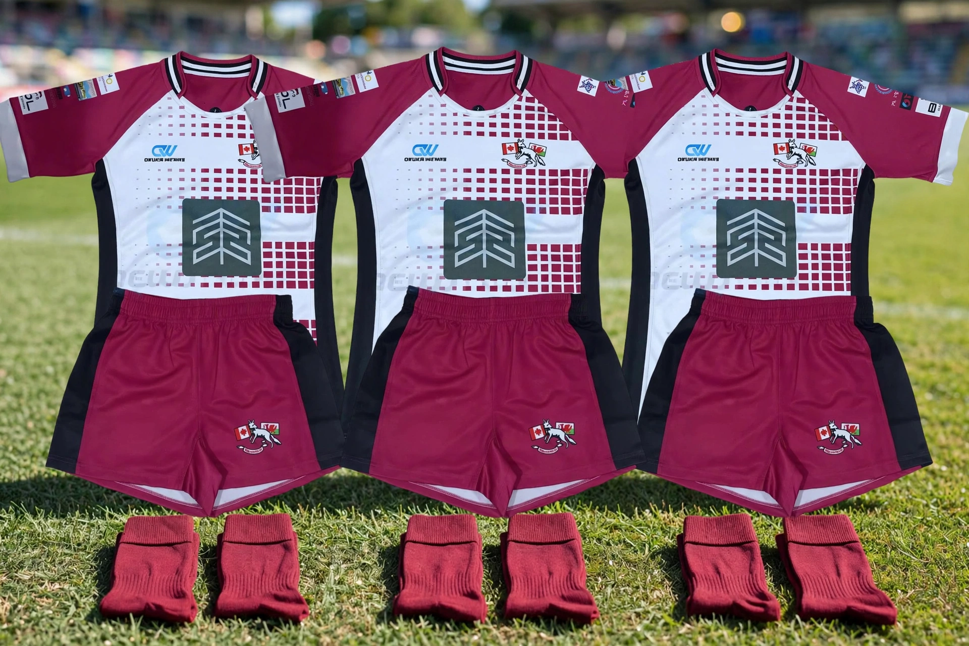 Flawless color consistency across rugby jerseys shorts and socks in maroon white with perfect sublimation dye match under sunlight